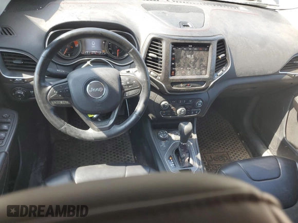 2019 Jeep Cherokee Trailhawk with VIN 1C4PJMBX0KD361639, listed as a Copart auction lot 60549865 with 95,888 mi miles and Salvage title. Bid and sale history available at DreamBid. Image 8.