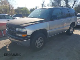 2004 Chevrolet Tahoe Special Service with VIN 1GNEK13V44J293230, listed as a IAAI auction lot 42004302 with 157,924 mi miles. Bid and sale history available at carsss.com. Image 2.