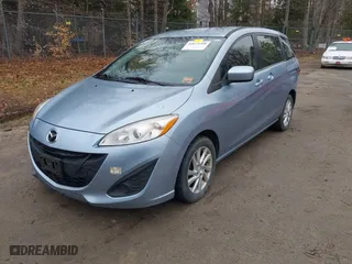 2012 Mazda Mazda5 Sport with VIN JM1CW2BL0C0141119, listed as a IAAI auction lot 42073200 with 142,805 mi miles. Bid and sale history available at carsss.com. Image 2.