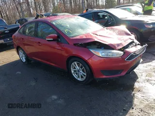 2017 Ford Focus SE z VIN 1FADP3F29HL256838, wystawiony jako IAAI lot #41875356 z przebiegiem 178 673 mil mil oraz . Historia ofert i sprzedaży dostępna na DreamBid. Obrazek 1.
