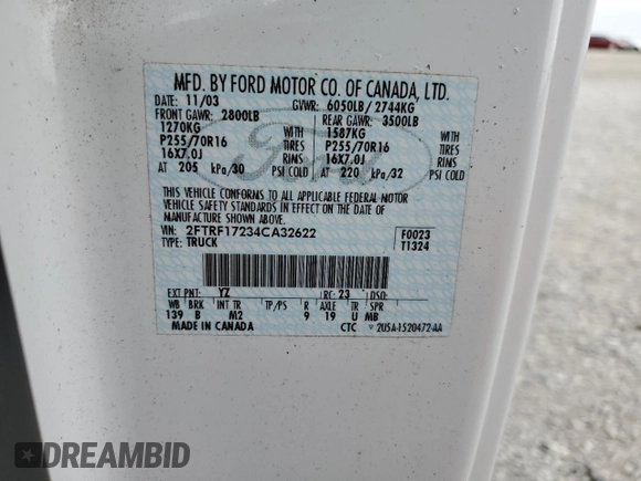 2004 Ford F-150 XL with VIN 2FTRF17234CA32622, listed as a Copart auction lot 53158095 with 217,728 mi miles and Salvage title. Bid and sale history available at DreamBid. Image 12.
