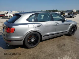 2019 Bentley Bentayga V8 z VIN SJAAM2ZV4KC024727, wystawiony jako Copart lot #80631684 z przebiegiem 38 304 mil mil oraz Nie do naprawy. Historia ofert i sprzedaży dostępna na DreamBid. Obrazek 4.