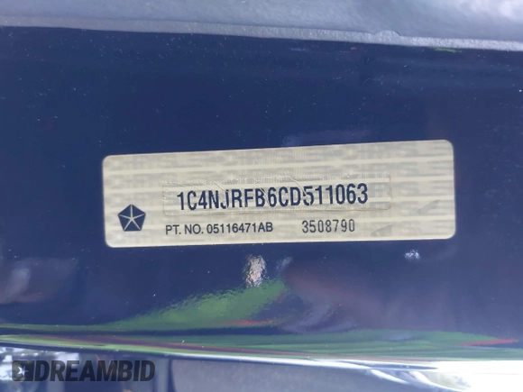 2012 Jeep Patriot Latitude with VIN 1C4NJRFB6CD511063, listed as a IAAI auction lot 42050442 with 103,144 mi miles and . Bid and sale history available at carsss.com. Image 9.