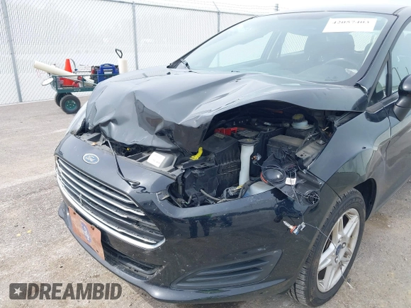 2018 Ford Fiesta SE with VIN 3FADP4EJ3JM132132, listed as a IAAI auction lot 42057403 with 75,944 mi miles and . Bid and sale history available at DreamBid. Image 6.
