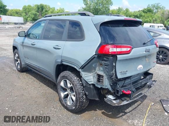 2014 Jeep Cherokee Trailhawk z VIN 1C4PJMBS4EW236950, wystawiony jako IAAI lot #42636128 z przebiegiem 170 491 mil mil oraz . Historia ofert i sprzedaży dostępna na DreamBid. Obrazek 3.