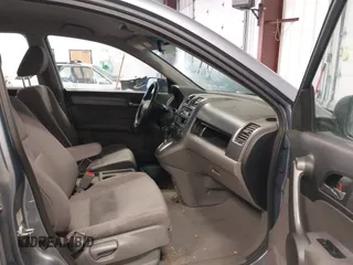2009 Honda CR-V LX with VIN JHLRE48359C018488, listed as a IAAI auction lot 41824887 with 203,235 mi miles. Bid and sale history available at carsss.com. Image 5.