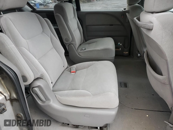 2010 Honda Odyssey LX z VIN 5FNRL3H20AB012805, wystawiony jako Copart lot #52243405 z przebiegiem 206 479 mil mil oraz Szkoda całkowita • Salvage title. Historia ofert i sprzedaży dostępna na DreamBid. Obrazek 12.