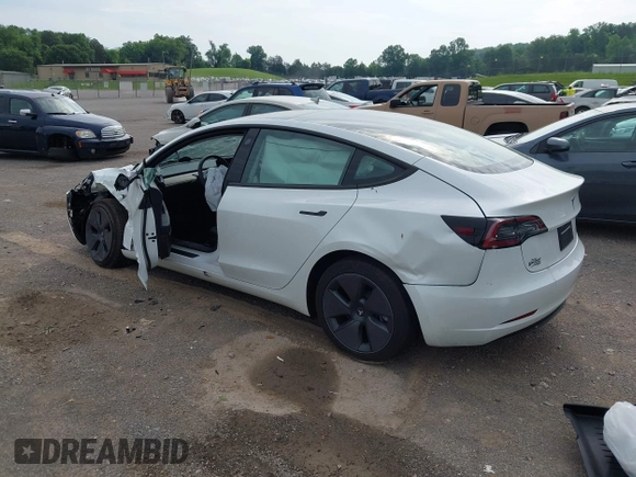 2023 Tesla Model 3 with VIN 5YJ3E1EA4PF644621, listed as a IAAI auction lot 42280312 with 41,262 mi miles and . Bid and sale history available at DreamBid. Image 3.
