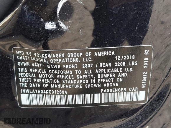 2019 Volkswagen Passat 2.0T Wolfsburg Edition with VIN 1VWLA7A34KC012694, listed as a IAAI auction lot 41579392 with 80,846 mi miles. Bid and sale history available at carsss.com. Image 9.