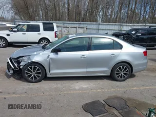 2014 Volkswagen Jetta TDI w/Premium/Nav z VIN 3VWLL7AJ3EM332617, wystawiony jako IAAI lot #42033000 z przebiegiem 186 444 mil mil oraz . Historia ofert i sprzedaży dostępna na DreamBid. Obrazek 14.