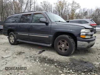 2005 Chevrolet Suburban LT with VIN 1GNFK16Z95J151301, listed as a Copart auction lot 83642854 with 190,221 mi miles and Salvage title. Bid and sale history available at DreamBid. Image 4.