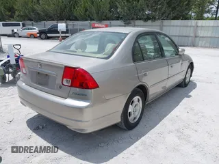 2004 Honda Civic Hybrid with VIN JHMES95644S021296, listed as a IAAI auction lot 42153296 with 281,563 mi miles. Bid and sale history available at carsss.com. Image 4.