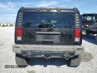 2005 Hummer H2 SUV z VIN 5GRGN23U55H109975, wystawiony jako Copart lot #42739655 z przebiegiem 257 578 mil mil oraz Czysty tytuł • Clean title. Historia ofert i sprzedaży dostępna na DreamBid. Obrazek 6.