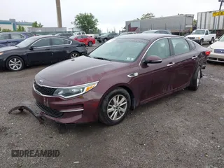 2016 Kia Optima LX with VIN 5XXGT4L31GG053429, listed as a IAAI auction lot 42464513 with 122,397 mi miles and . Bid and sale history available at DreamBid. Image 18.