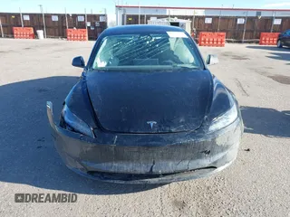 2025 Tesla Model 3 Long Range with VIN 5YJ3E1EB5SF877778, listed as a IAAI auction lot 41639595 with 8,295 mi miles and . Bid and sale history available at DreamBid. Image 11.