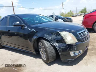 2012 Cadillac CTS Premium with VIN 1G6DP5E35C0129064, listed as a IAAI auction lot 42666308 with 151,694 mi miles and . Bid and sale history available at DreamBid. Image 6.