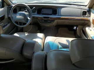 1999 Mercury Grand Marquis LS with VIN 2MEFM75W0XX731008, listed as a Copart auction lot 54375795 with 88,080 mi miles and Salvage Title. Bid and sale history available at DreamBid. Image 8.