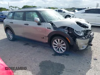 2023 MINI Clubman Cooper S with VIN WMWXJ1C03P2U08484, listed as a IAAI auction lot 41056651 with 12,948 mi miles. Bid and sale history available at carsss.com. Image 1.