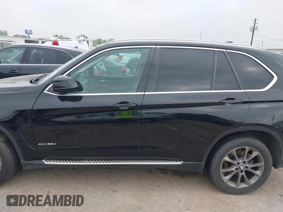 2014 BMW X5 xDrive35d with VIN 5UXKS4C56E0J93861, listed as a IAAI auction lot 41906775 with 149,263 mi miles. Bid and sale history available at carsss.com. Image 14.