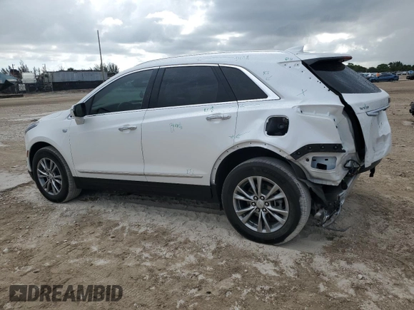 2022 Cadillac XT5 FWD Premium Luxury z VIN 1GYKNCRS0NZ175748, wystawiony jako Copart lot #61651885 z przebiegiem 13 747 mil mil oraz Szkoda całkowita • Salvage title. Historia ofert i sprzedaży dostępna na DreamBid. Obrazek 2.