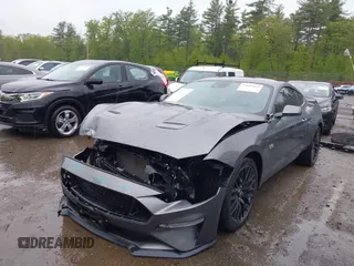 2022 Ford Mustang GT with VIN 1FA6P8CF1N5108602, listed as a IAAI auction lot 39889660 with 21,711 mi miles and . Bid and sale history available at DreamBid. Image 2.