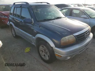 2003 Suzuki Grand Vitara z VIN JS3TE62V534100751, wystawiony jako Copart lot #76714894 z przebiegiem Nie podano mil oraz Nie do naprawy • Non repairable. Historia ofert i sprzedaży dostępna na DreamBid. Obrazek 4.