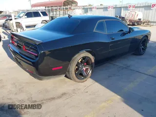 2021 Dodge Challenger SRT Hellcat with VIN 2C3CDZC97MH634623, listed as a IAAI auction lot 41228580 with 36,027 mi miles and . Bid and sale history available at DreamBid. Image 4.