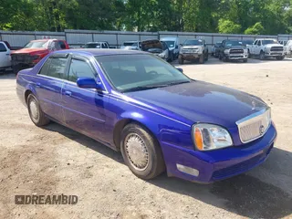 2005 Cadillac DeVille with VIN 1G6KD54Y95U214904, listed as a IAAI auction lot 42014527 with 144,207 mi miles. Bid and sale history available at carsss.com. Image 1.