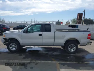 2007 Ford F-150 STX with VIN 1FTRX14W87KC40659, listed as a IAAI auction lot 41423345 with 145,811 mi miles. Bid and sale history available at carsss.com. Image 14.