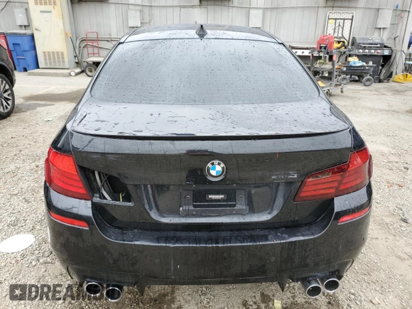 2013 BMW M5 z VIN WBSFV9C56DD096294, wystawiony jako Copart lot #57855005 z przebiegiem Nie podano mil oraz Tytuł czysty. Historia ofert i sprzedaży dostępna na DreamBid. Obrazek 6.