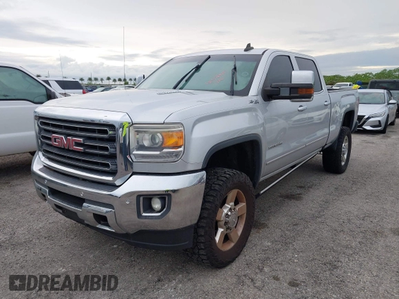 2016 GMC Sierra 2500HD SLT z VIN 1GT12TE89GF183548, wystawiony jako IAAI lot #40476400 z przebiegiem 203 148 mil mil oraz . Historia ofert i sprzedaży dostępna na DreamBid. Obrazek 2.