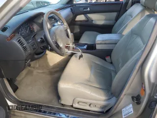 1999 Infiniti Q45 z VIN JNKBY31A1XM605401, wystawiony jako Copart lot #76582304 z przebiegiem 115 791 mil mil oraz Czysty tytuł • Clean title. Historia ofert i sprzedaży dostępna na DreamBid. Obrazek 7.