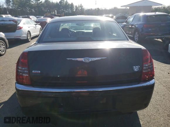 2005 Chrysler 300 300C AWD z VIN 2C3AK63H65H671814, wystawiony jako Copart lot #82867974 z przebiegiem 153 186 mil mil oraz Nie do naprawy. Historia ofert i sprzedaży dostępna na DreamBid. Obrazek 6.