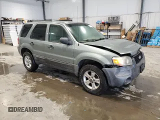 2006 Ford Escape XLT with VIN 1FMYU03136KD34592, listed as a Copart auction lot 71872694 with 185,292 mi miles and Clean Title. Bid and sale history available at carsss.com. Image 4.