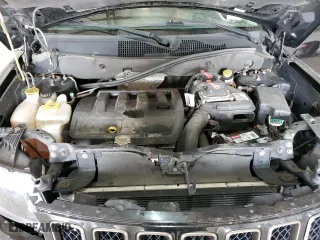 2016 Jeep Compass Sport with VIN 1C4NJDBB4GD690413, listed as a Copart auction lot 50320365 with 127,356 mi miles and Salvage Title. Bid and sale history available at carsss.com. Image 12.