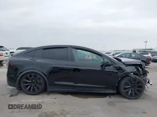 2023 Tesla Model X Plaid with VIN 7SAXCBE63PF376320, listed as a IAAI auction lot 40954738 with Not Provided miles and . Bid and sale history available at DreamBid. Image 14.