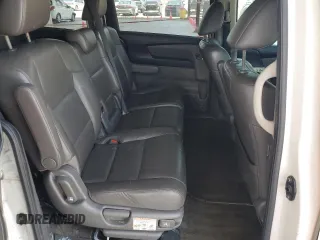 2014 Honda Odyssey Touring z VIN 5FNRL5H9XEB123330, wystawiony jako Copart lot #59023145 z przebiegiem 118 371 mil mil oraz Nie do naprawy • Non repairable. Historia ofert i sprzedaży dostępna na DreamBid. Obrazek 11.