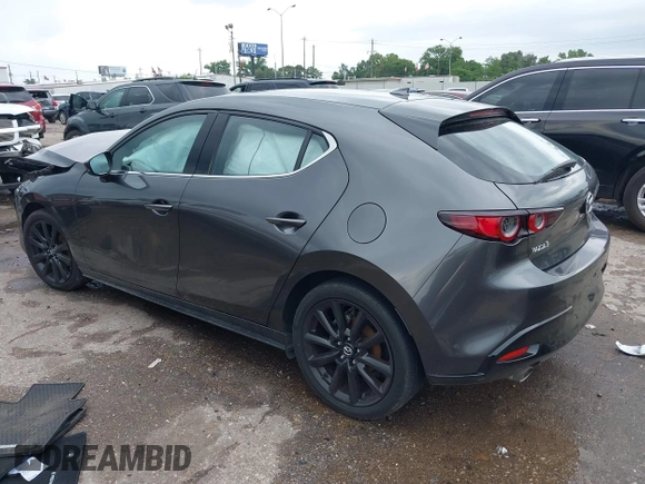 2021 Mazda 3 Premium z VIN JM1BPAML1M1318708, wystawiony jako IAAI lot #42178243 z przebiegiem 62 455 mil mil oraz . Historia ofert i sprzedaży dostępna na DreamBid. Obrazek 3.