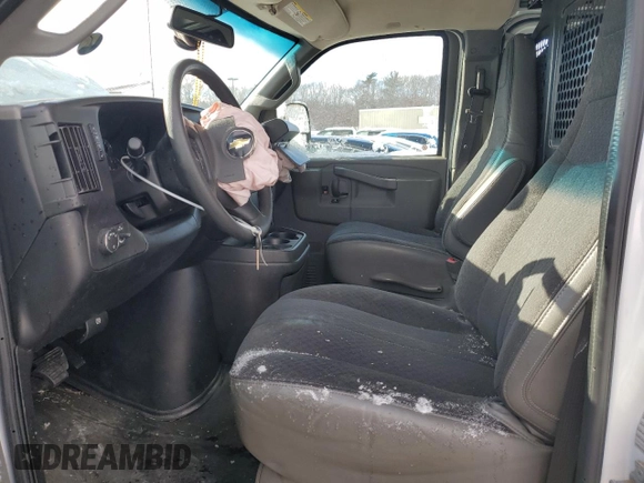 2019 Chevrolet Express Cargo with VIN 1GCWGAFG4K1234090, listed as a Copart auction lot 59241115 with 142,307 mi miles and Salvage title. Bid and sale history available at DreamBid. Image 7.