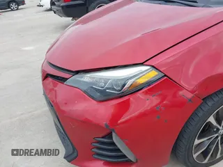 2017 Toyota Corolla L z VIN 5YFBURHE9HP610157, wystawiony jako IAAI lot #40999523 z przebiegiem 185 454 mil mil oraz . Historia ofert i sprzedaży dostępna na DreamBid. Obrazek 18.