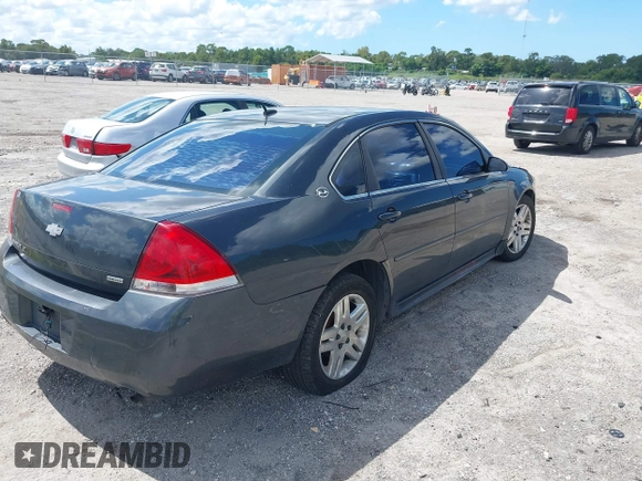 2014 Chevrolet Impala LT with VIN 2G1WB5E31E1146318, listed as a IAAI auction lot 40413281 with 422,345 mi miles and . Bid and sale history available at DreamBid. Image 4.