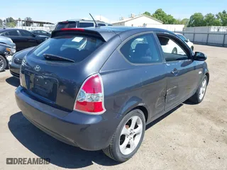 2007 Hyundai Accent SE with VIN KMHCN36C37U031369, listed as a IAAI auction lot 42093760 with 95,919 mi miles. Bid and sale history available at carsss.com. Image 4.
