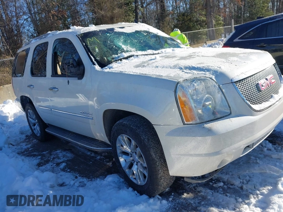 2014 GMC Yukon Denali with VIN 1GKS2EEF3ER181504, listed as a IAAI auction lot 41267224 with 165,478 mi miles. Bid and sale history available at carsss.com. Image 1.