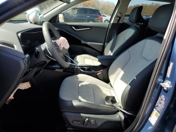 2025 Kia Niro SX Touring with VIN KNDCT3LEXS5235850, listed as a Copart auction lot 52300695 with 1,980 mi miles and Salvage Title. Bid and sale history available at carsss.com. Image 7.