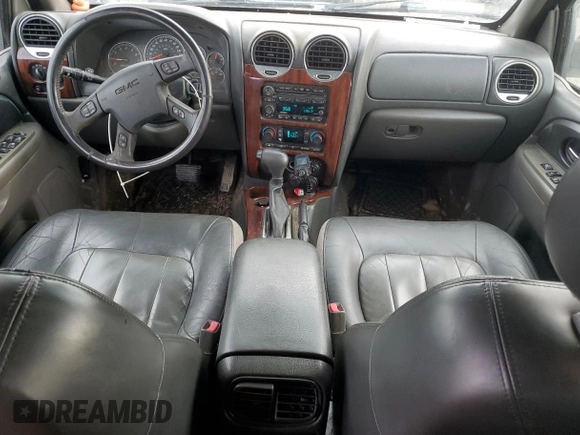 2004 GMC Envoy SLT z VIN 1GKDT13S242171925, wystawiony jako Copart lot #46262535 z przebiegiem 200 396 mil mil oraz Szkoda całkowita • Salvage title. Historia ofert i sprzedaży dostępna na DreamBid. Obrazek 8.