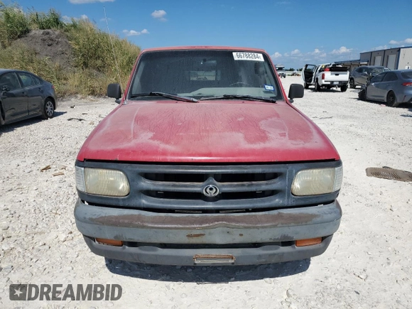 1994 Mazda B-Series Truck z VIN 4F4CR12AXRTN07635, wystawiony jako Copart lot #66788284 z przebiegiem 255 020 mil mil oraz Szkoda całkowita • Salvage title. Historia ofert i sprzedaży dostępna na DreamBid. Obrazek 5.