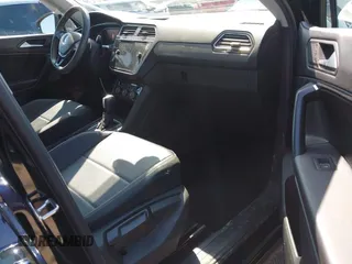 2021 Volkswagen Tiguan SE with VIN 3VV3B7AX1MM045478, listed as a IAAI auction lot 41947899 with 56,694 mi miles and . Bid and sale history available at DreamBid. Image 5.