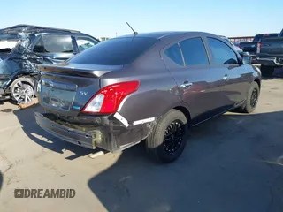 2015 Nissan Versa SV with VIN 3N1CN7AP5FL855424, listed as a IAAI auction lot 41974356 with 85,426 mi miles. Bid and sale history available at carsss.com. Image 4.