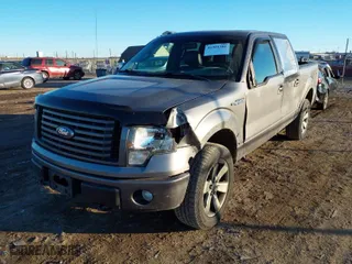 2011 Ford F-150 XL with VIN 1FTFW1EF5BFC88996, listed as a IAAI auction lot 41301381 with 145,450 mi miles. Bid and sale history available at carsss.com. Image 2.