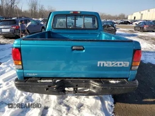 1996 Mazda B-Series 2WD Truck with VIN 4F4CR12A9TTM45488, listed as a Copart auction lot 42214795 with 137,409 mi miles and Salvage Title. Bid and sale history available at carsss.com. Image 6.